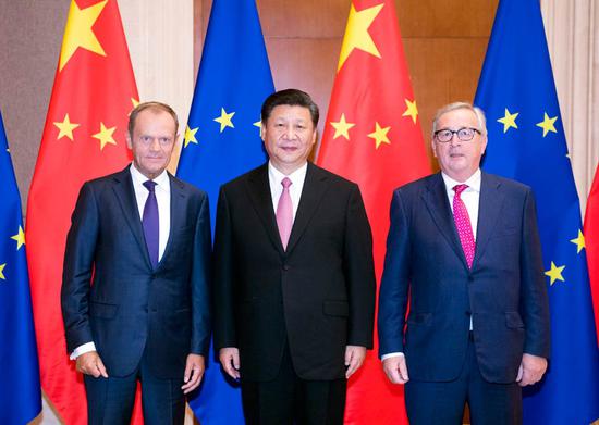 President Xi Jinping meets with European Council President Donald Tusk (left) and European Commission President Jean-Claude Juncker at the Diaoyutai State Guesthouse in Beijing on Monday. Xi said the two sides should step up strategic dialogue and coordination. (LI XUEREN / XINHUA)