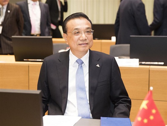 Chinese Premier Li Keqiang addresses the 12th Asia-Europe Meeting (ASEM) Summit in Brussels, Belgium, Oct. 19, 2018. (Xinhua/Huang Jingwen)