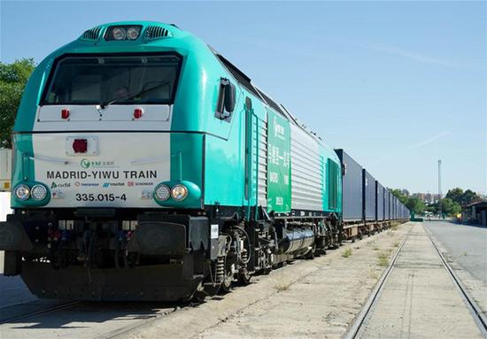 A freight train leaves for China's Yiwu City in Madrid, Spain, May 18, 2015. (Xinhua/Xie Haining)